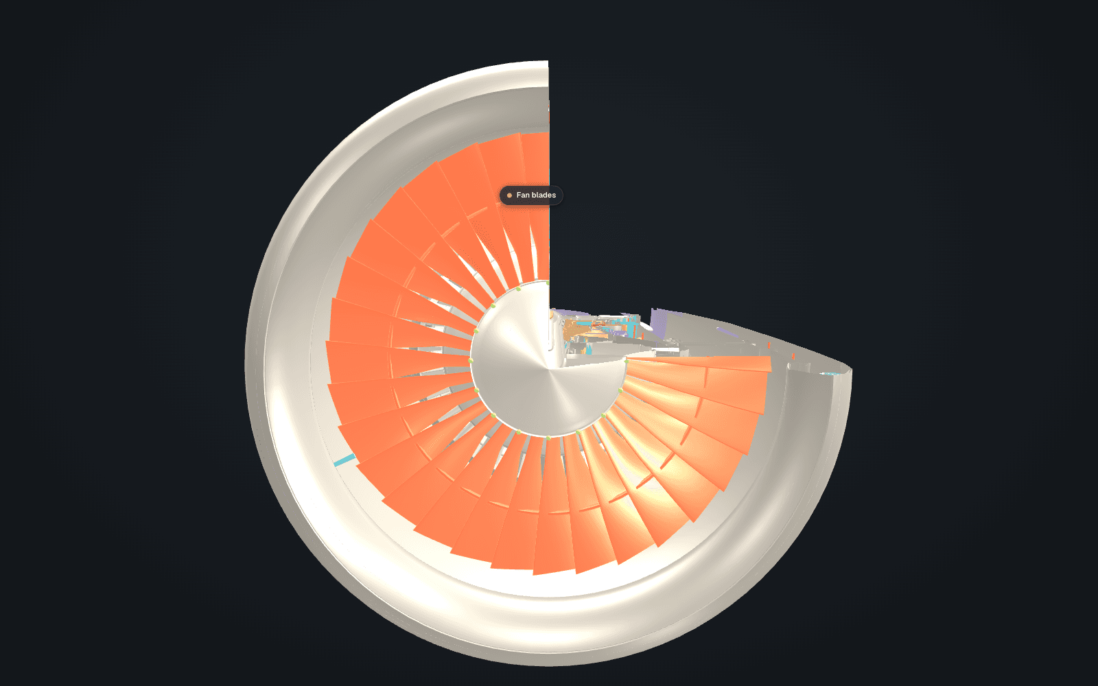 The fan seen from the front with its thirty-two blades selected and highlighted in orange, the upper quadrant cut away to show the spinner and hub.